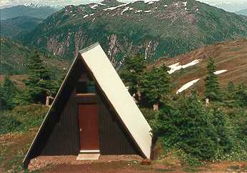A-frame cabin in the mountains.