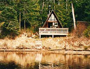 Lakeside cabin scene.